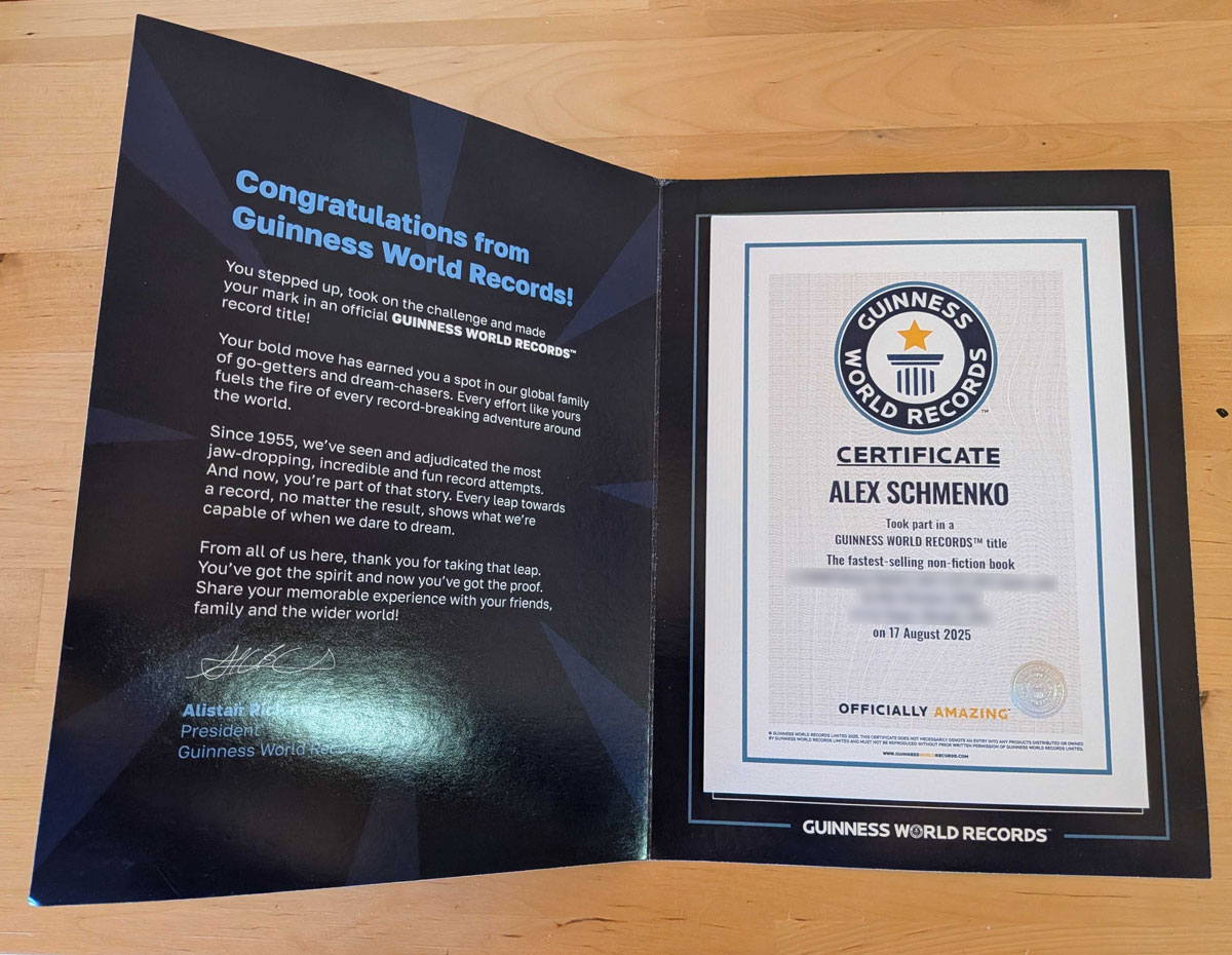 A redacted Guinness World Records certificate for the fastest-selling nonfiction book, with the recipient’s name blurred out
